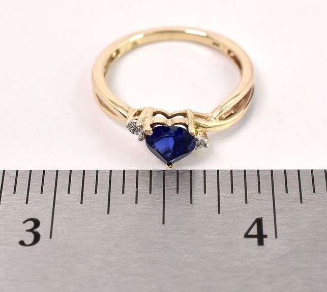 Adventurous Synthetic Blue Sapphire and Diamond Ring In Yellow Gold