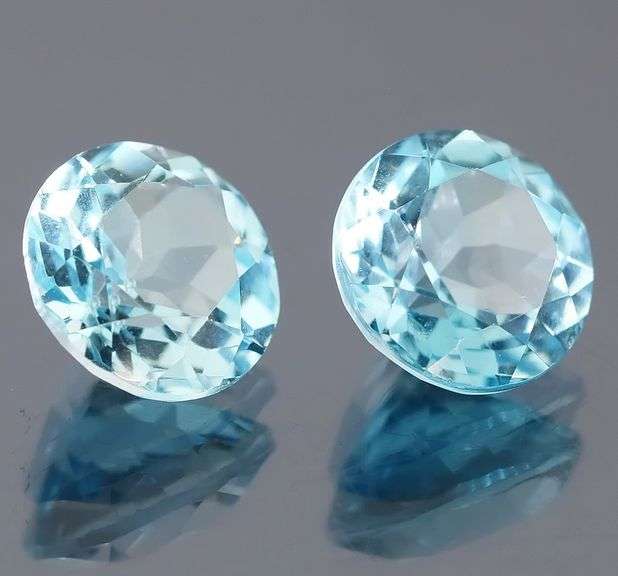 Heavy 9.50ct vivid sky blue Topaz set