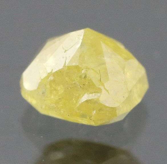 Nice .32ct cushion cut yellow Diamond