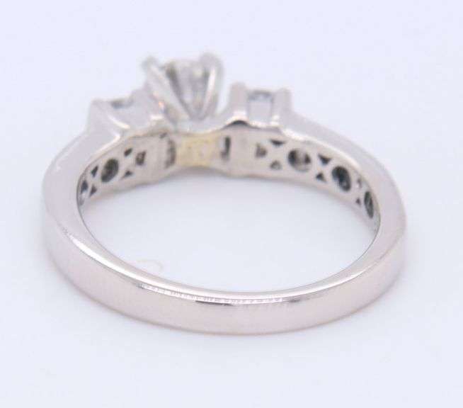 Brilliant Platinum Round in Princess Cut Diamond Setting Ring