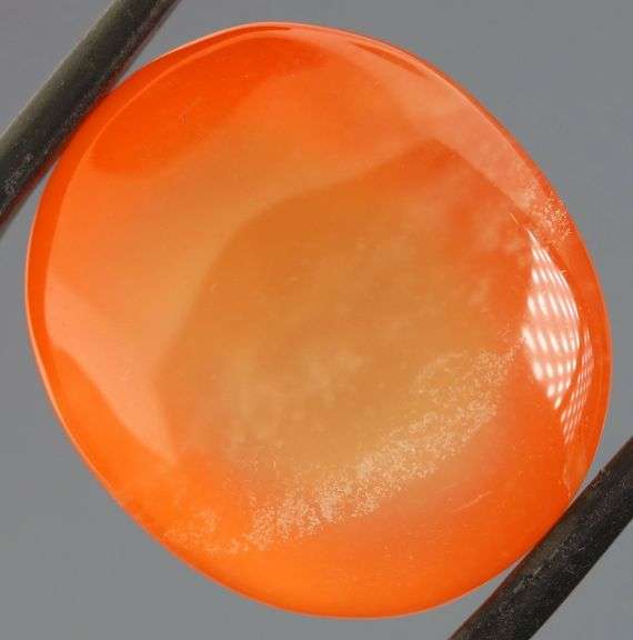 Dazzling 33.52ct orange Agate cabochon