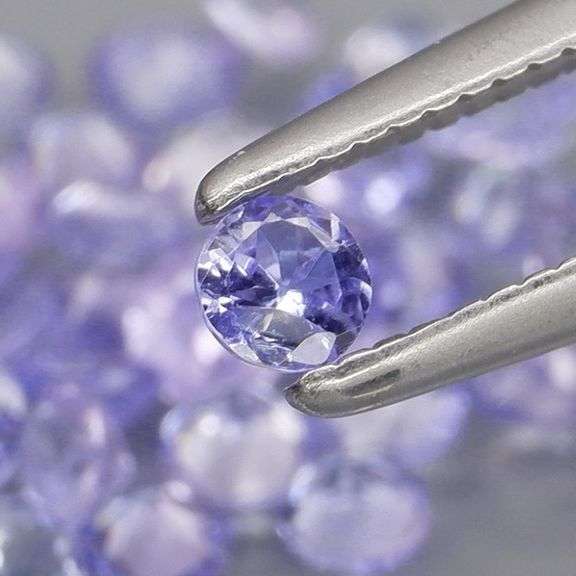 Heavy flashing 3.83ct diamond cut Tanzanite set