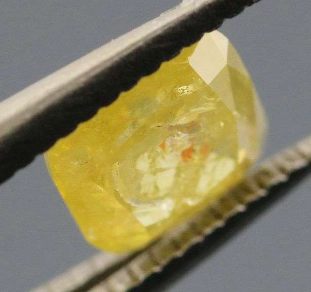 Glittering .32ct cushion cut golden yellow Diamond