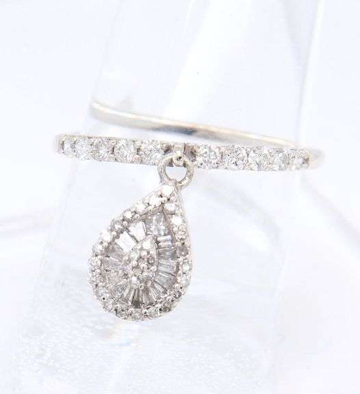 Dazzling Platinum Baguette and Round Diamond Dangle Ring