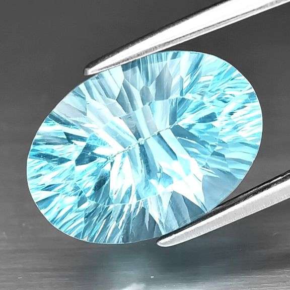 Dazzling 7.11ct high fire concave cut Topaz