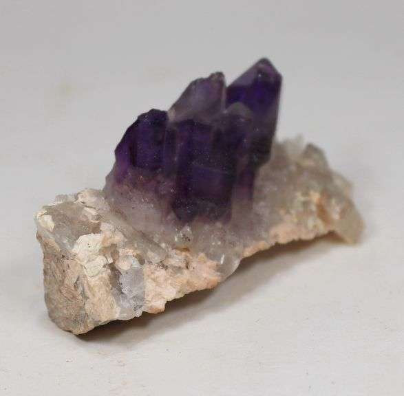 Step-like 244.78ct natural Amethyst in matrix
