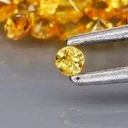Awesome 3.63ct round cut yellow Sapphire set