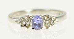 10K White Gold Oval Tanzanite Diamond Cluster Accent Ring
