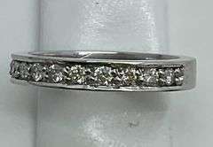 LADIES 14K WHITE GOLD AND DIAMOND BAND / RING