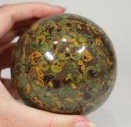 Deliciously beautiful 3,705ct Fruit Jasper sphere
