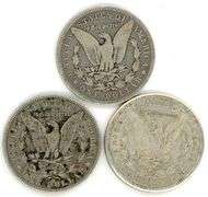 Three Different Morgan Silver Dollars 1896-O, 1900-O, & 1921-D.