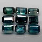 Heated only! 5.80ct blue green Sapphire set