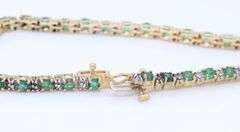 Handsome Yellow Gold Emerald and Diamond accent Bracelet