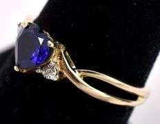 Adventurous Synthetic Blue Sapphire and Diamond Ring In Yellow Gold