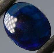 Magnificent 1.27ct blue and green flashing Black Opal