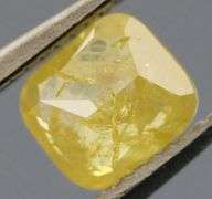 Glittering .32ct cushion cut golden yellow Diamond