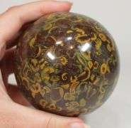 Deliciously beautiful 3,705ct Fruit Jasper sphere