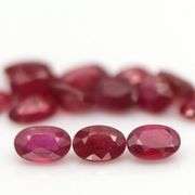 Rich 9.18ct oval cut imperial red Ruby set