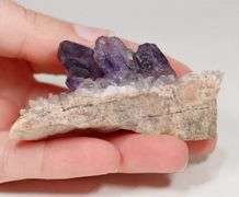 Step-like 244.78ct natural Amethyst in matrix