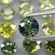 Heated only! 4.66ct round cut Australian Sapphire set