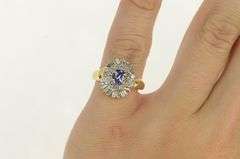 14K Yellow Gold Oval Tanzanite Diamond Halo Engagement Ring