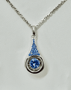 "Show stopper" solid sterling silver with fancy blue dancing center stone pendant