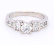 Brilliant Platinum Round in Princess Cut Diamond Setting Ring