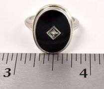 Stunning Diamond and Black Onyx Ring in White Gold
