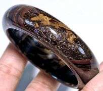 Simply stunning 276ct crystal core Boulder Opal bangle
