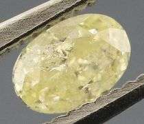 Sparkling .22ct oval cut yellow Diamond