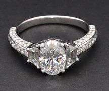 2.42ctw Oval Trapezoid and Round Diamond Three Stone Straight Engagement Ring in 18K