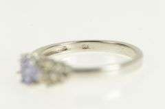 10K White Gold Oval Tanzanite Diamond Cluster Accent Ring