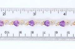 Attractive Yellow Gold Amethyst Heart and Diamond accent Bracelet