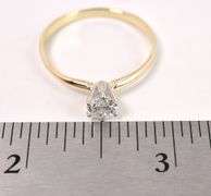 Dazzling Solitaire Diamond Ring In 14K Yellow Gold