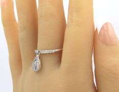 Dazzling Platinum Baguette and Round Diamond Dangle Ring
