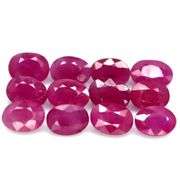 Heated only! 13.45ct violet red Ruby set