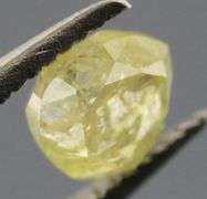 Sparkling .37ct pear cut yellow Diamond