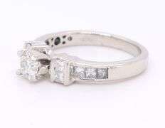 Brilliant Platinum Round in Princess Cut Diamond Setting Ring