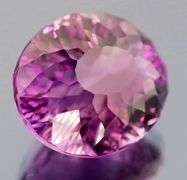 Giant! 37.50ct natural concave cut Amethyst