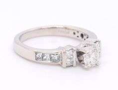 Brilliant Platinum Round in Princess Cut Diamond Setting Ring