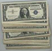 Nearly full pack of 98 Series of 1957 $1 Silver Certificates in VG to AU
