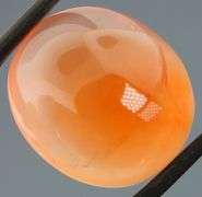 Dazzling 33.52ct orange Agate cabochon