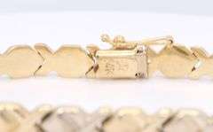 Handsome Yellow Gold Textured and High Polished XO Bracelet