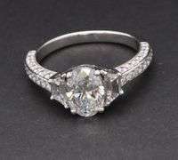 2.42ctw Oval Trapezoid and Round Diamond Three Stone Straight Engagement Ring in 18K