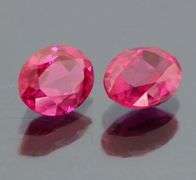 Fantastic 4.18ct cherry red created Ruby pair