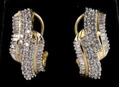 Sparkling Diamond Dangle Earrings in Yellow Gold