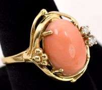 Enticing conch shell and Diamond 14K Yellow Gold Ring