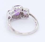 Charming White Gold Three Stone Amethyst and Diamond Halo Ring