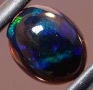 Magnificent 1.27ct blue and green flashing Black Opal