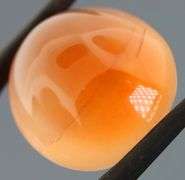 Dazzling 33.52ct orange Agate cabochon